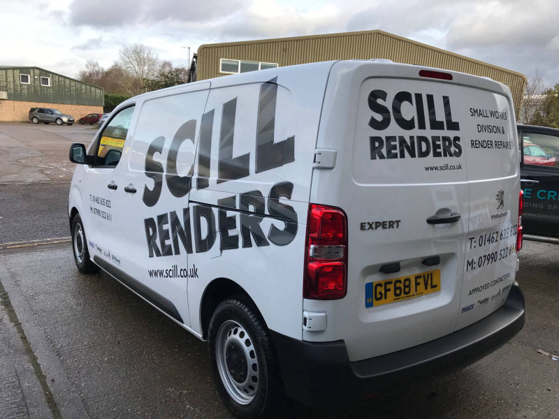 van partial wrap sign written 